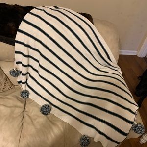 Blue and white stripped knit blanket